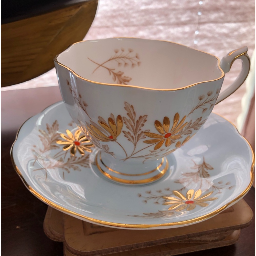 Lovely Queen Anne Blue and Gold with a Touch of Orange Raised Floral Teacup Set